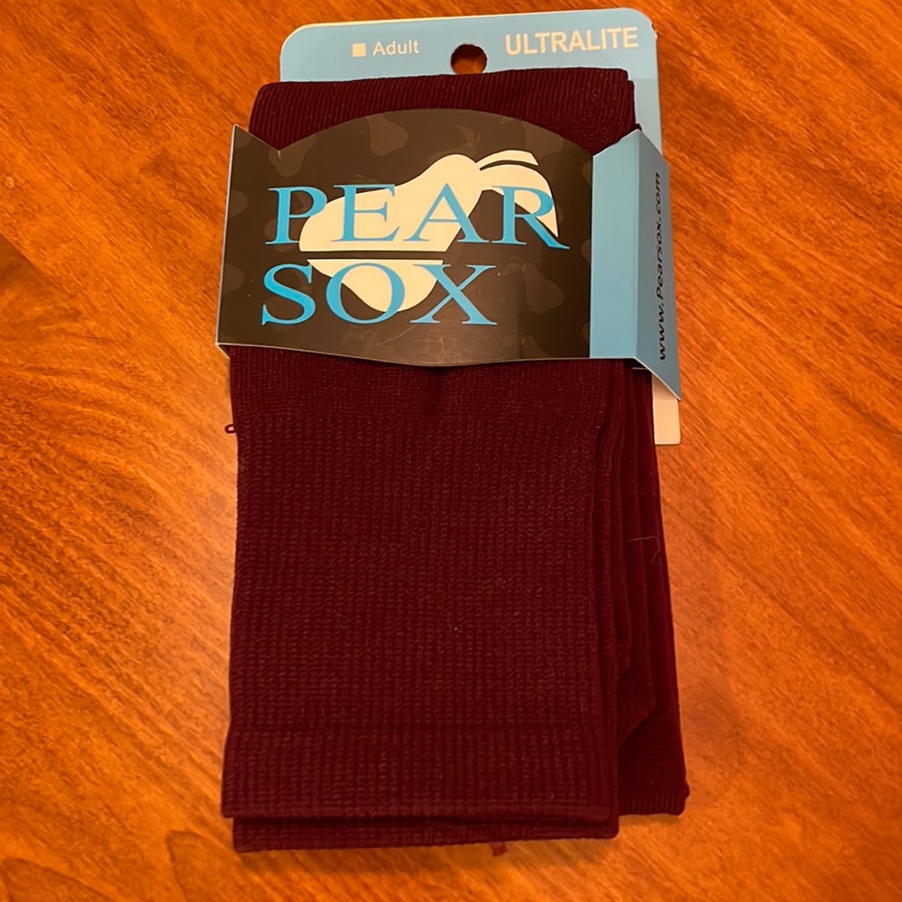 Adult sized maroon softball socks.
